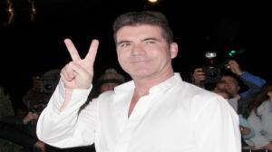 Simon Cowell given blessing by pregnant girlfriend's husband