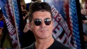 Simon Cowell expecting first child with close friend’s wife Lauren Silverman: report