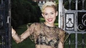 Miley Cyrus Gets Sheer and $exy