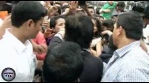 Shahrukh Khan gets pulled by FEMALE FANS!