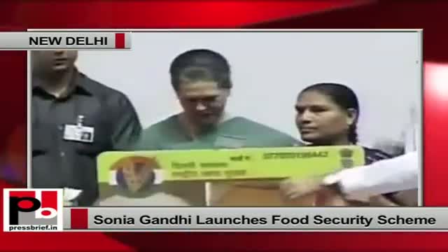 Sonia Gandhi distributes food security ration cards to beneficiaries in Delhi