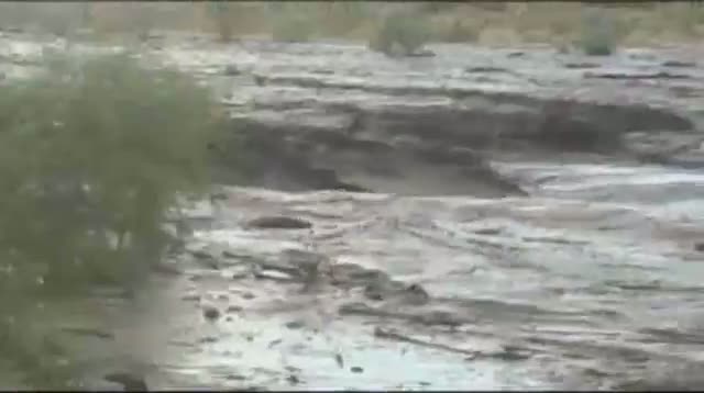 Massive Mud Flow Swallows Desert Road