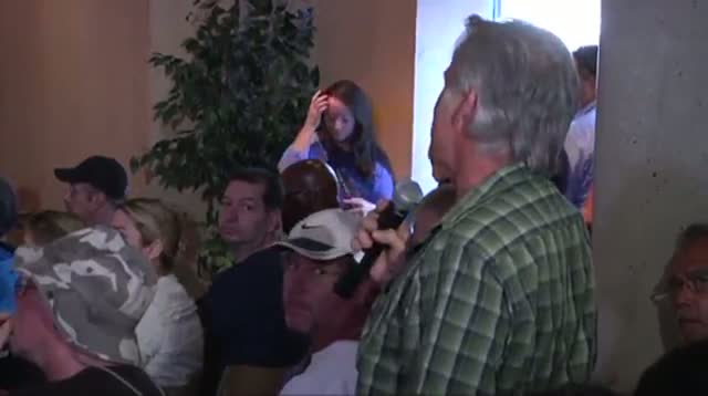 Fiesty Town Hall Questions McCain on Syria