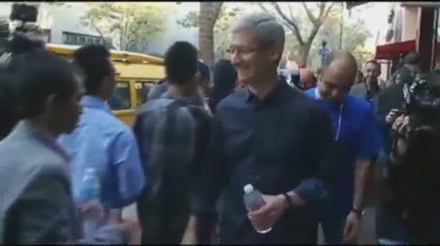 Apple CEO Tim Cook Surprises iPhone Crowd