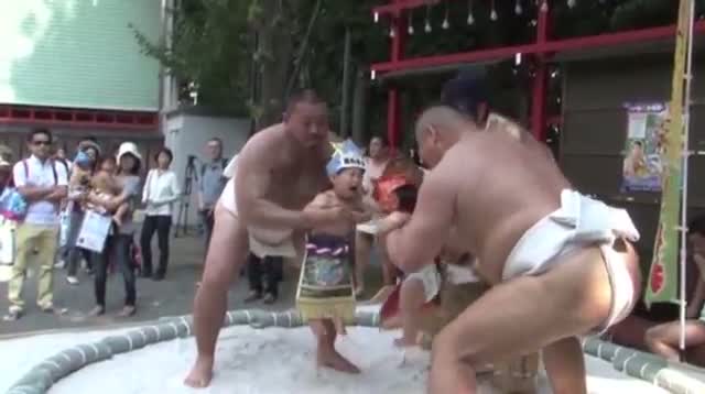 Sumo Wrestlers Make Babies Cry for a Cause