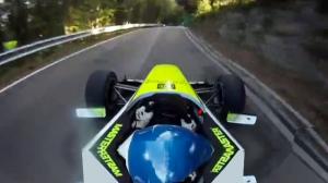 Formula One Car Speeds Up Mountain Road