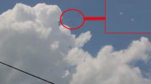UFO Spotted Around Clouds