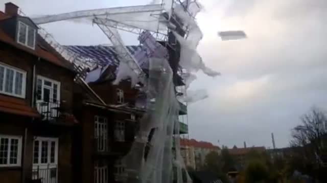 Storm Rips Scaffolding From Building