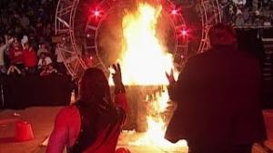 Kane burns The Undertaker