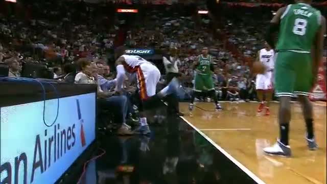NBA: Dwyane Wade Crashes Into Lady On Sideline