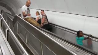 An Idiot Attempts To Ride Down The Wrong Escalator