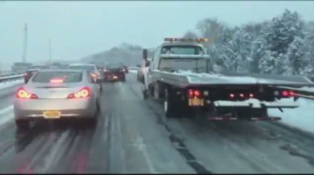 East Coast Storm Dumps Snow, Snarls Traffic