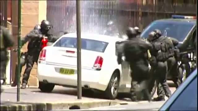 Dramatic End to Standoff at Australia Parliament