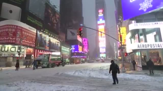 Workers Begin Clearing Snow in Times Square