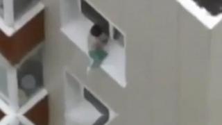 Baby Walking Along A 9 Story High Rise Window Ledge In India