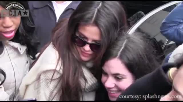 Selena Gomez Poses With Die-hard Fans As She Leaves Her Hotel In London