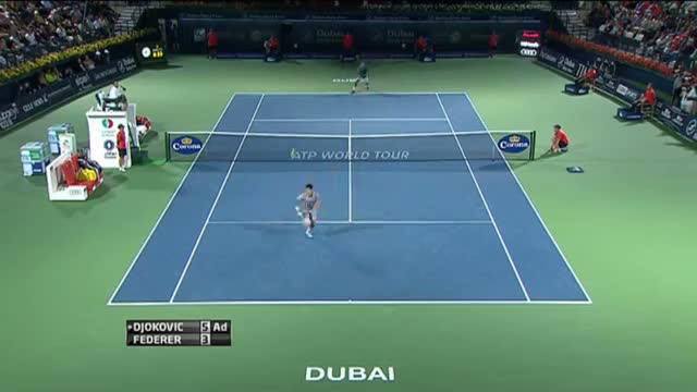 Roger Federer Hits Hot Shot In Dubai Against Djokovic