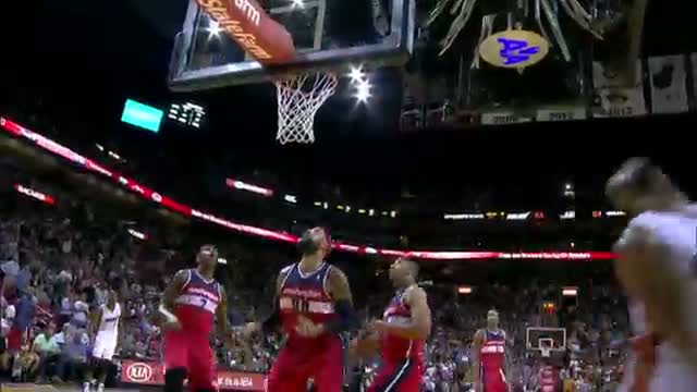 NBA: Dwyane Wade Contorts His Body in Mid-Air for the Bucket