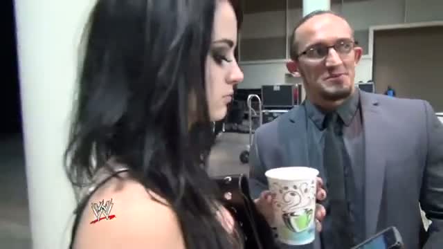 Adrian Neville & Paige get ready for the first NXT signing at WrestleMania 30 Axxess