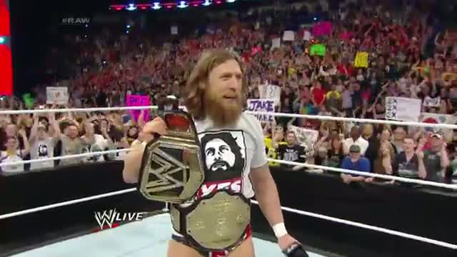 Daniel Bryan celebrates his WWE World Heavyweight Championship victory: WWE Raw, April 7, 2014