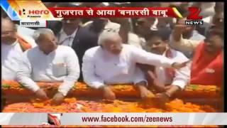 Varanasi: People on the streets to cheer Narendra Modi's roadshow
