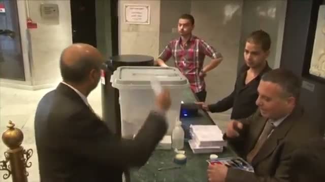 Syrians Vote in Historic Election Amid Civil War