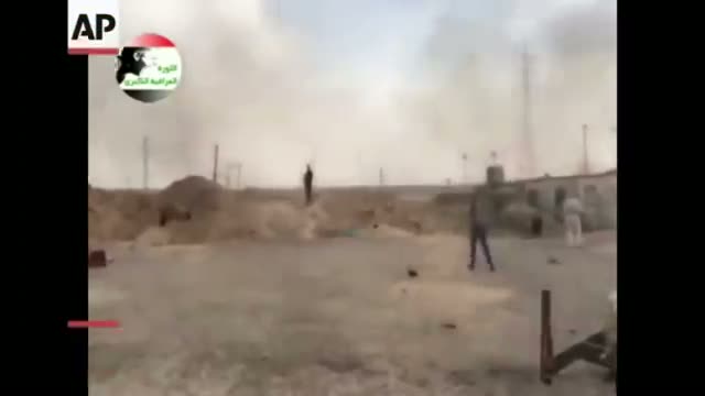 Iraqi Army Troops Flee Base in Tikrit