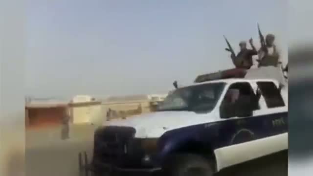 ISIL Militants Parade Through Beiji