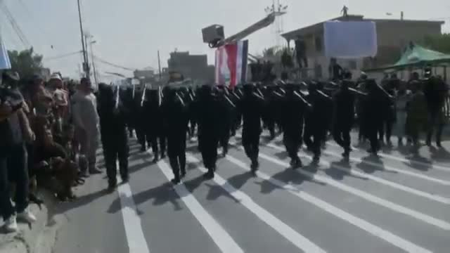 Militiamen Parade in Several Iraqi Cities