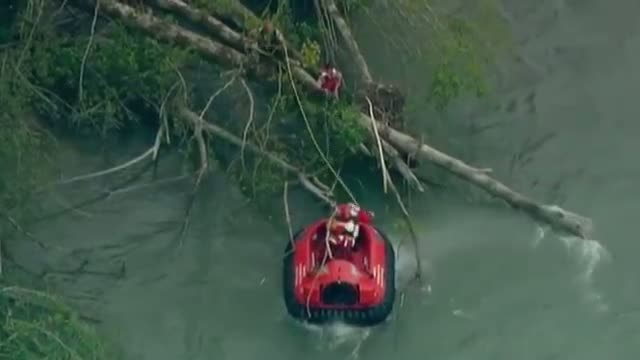 Two Rafters Rescued After Raft Flips