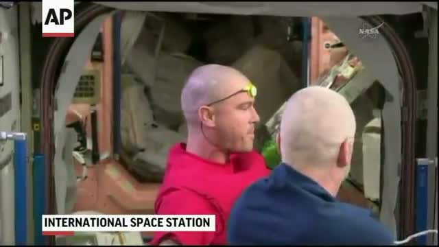 NASA Astronauts Shave Head for USA Loss