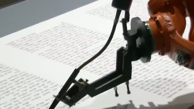 Robot Writes Jewish Torah Scroll