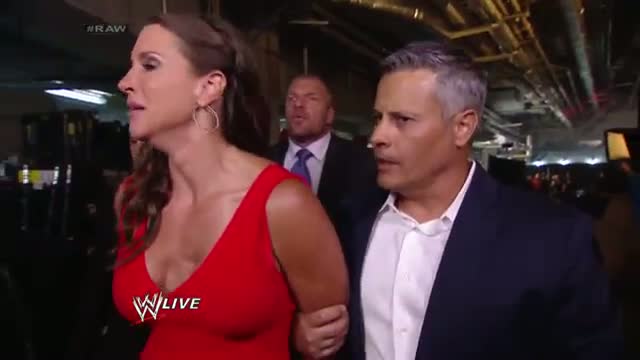 Stephanie McMahon is escorted out of the arena: WWE Raw, July 21, 2014