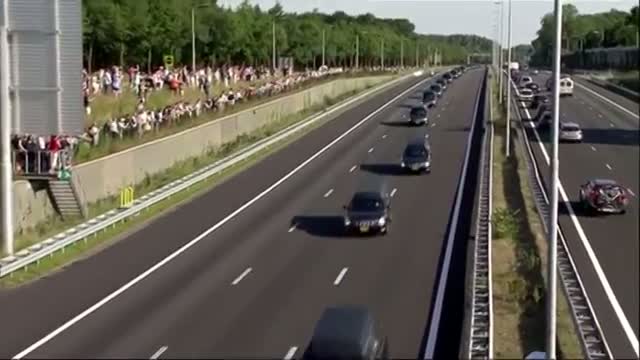 Mourners Gather As MH17 Bodies Transported