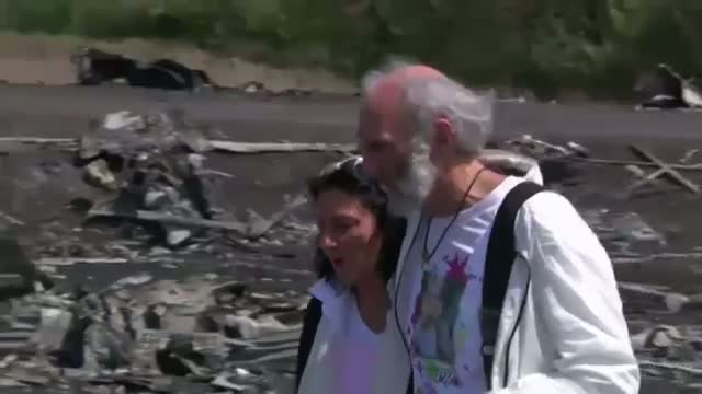 Family of MH17 Victim Pay Respects at Crash Site