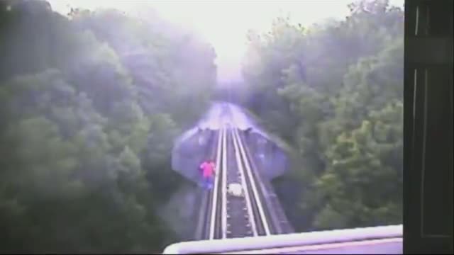Two Women Narrowly Avoid Being Hit by Train