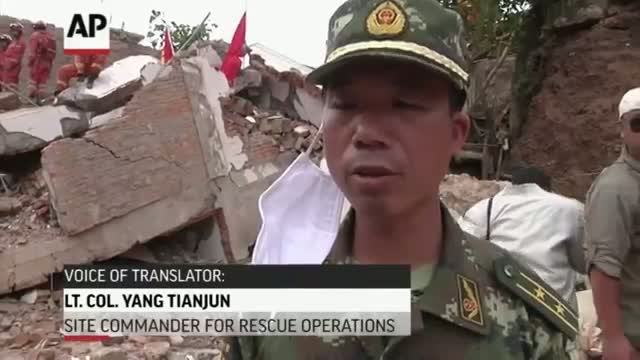 Rescue Workers Dig Through China Quake Debris