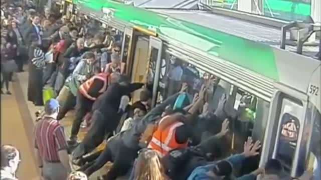 People power frees man trapped by Perth train