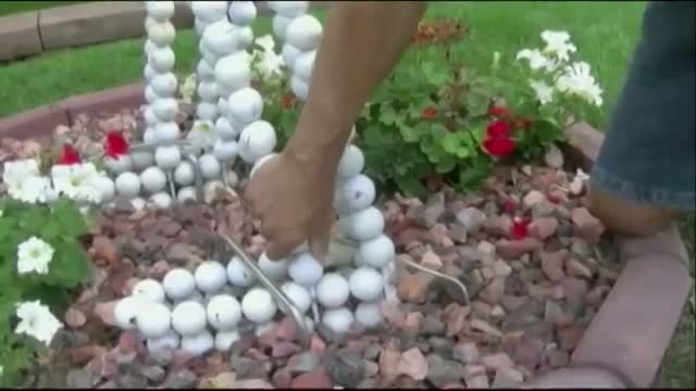 Iowa Man Builds Statue of a Golfer Out of Balls