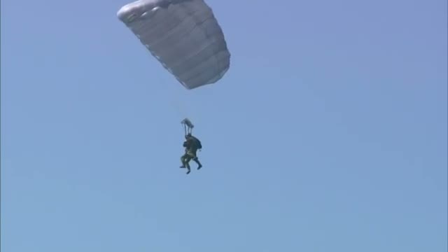 US Ambassador Skydives With Polish Troops