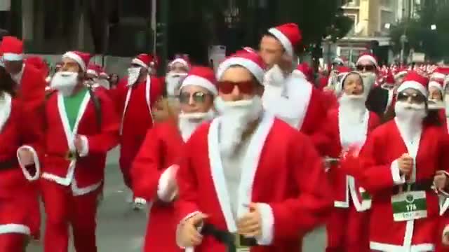 Santa Lookalikes Run Marathons Across Globe Video