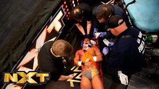 Adrian Neville gets stretchered out of the arena after his match with Kevin Owens