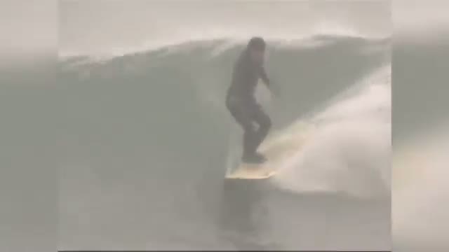 Russian Surfers Brave Icy Cold Waters Video