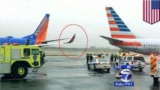 La Guardia fender bender: Two jets smash into each other while taxiing at New York Airport Video