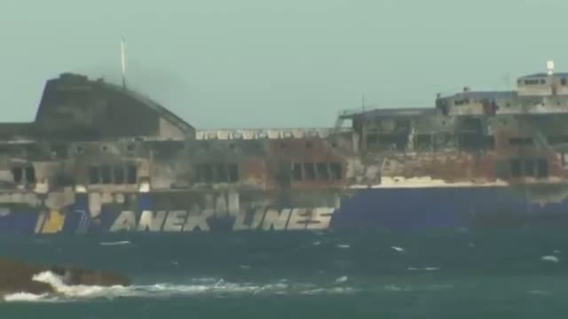 Charred Greek Ferry Towed to Port in Italy Video