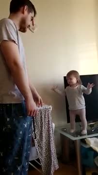 Adorable daddy/daughter standoff