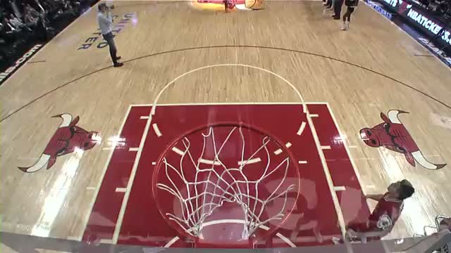 NBA: Bulls Fan Sinks Half-Court Shot, Gets Tackled by Benny the Bull 