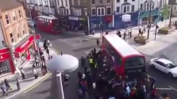 LONDON'S PEOPLE TO LIFT THE BUS OFF CYCLISTS CRUSHED LEG IN Walthamstow