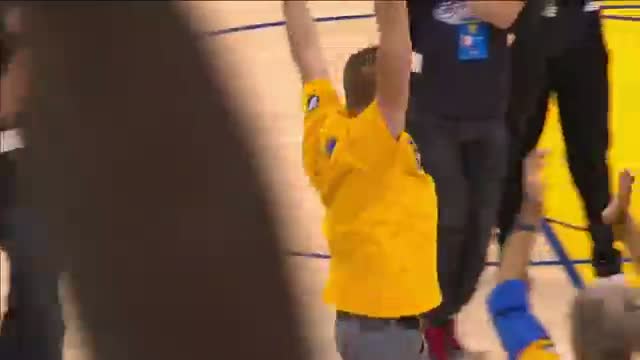 NBA: Warriors' Fan Sinks Half-Court Shot to Win Car