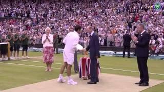 Roger Federer lifts the runners-up trophy - Wimbledon 2015